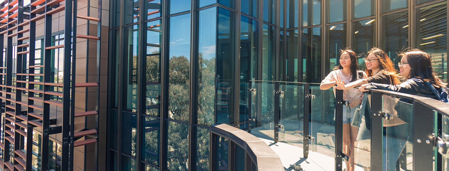 Students standing outside building