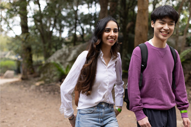 Students walking around together outside